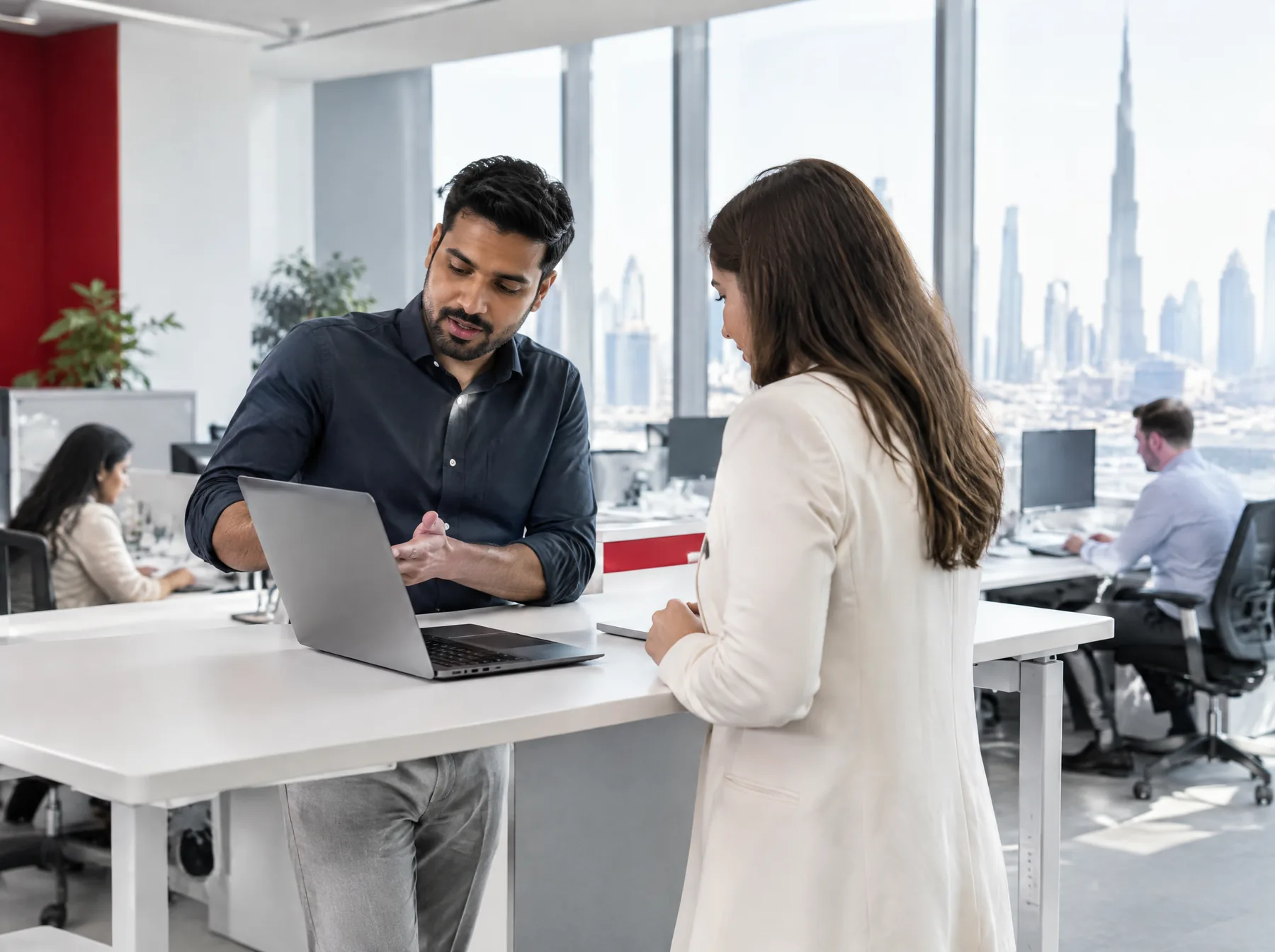 An IT Solutions engineer walking a colleague through a network rollout